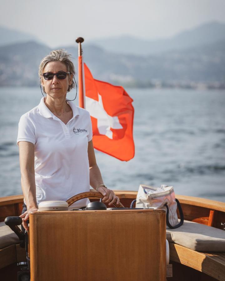 Grand Hotel Campione Campione dʼItalia Exterior foto A Swiss woman on a boat