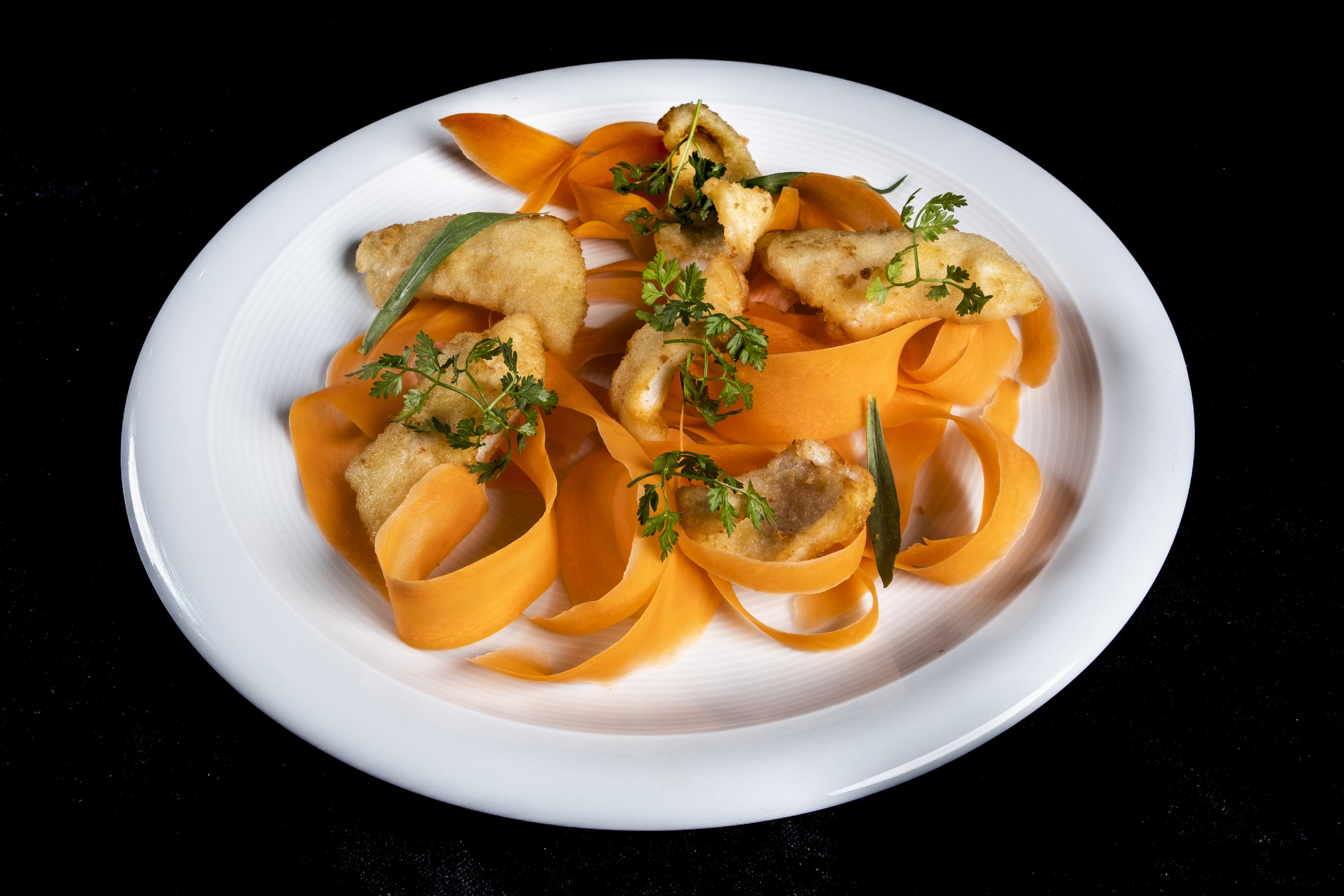 Grand Hotel Campione Campione dʼItalia Exterior foto A plate of carrot salad
