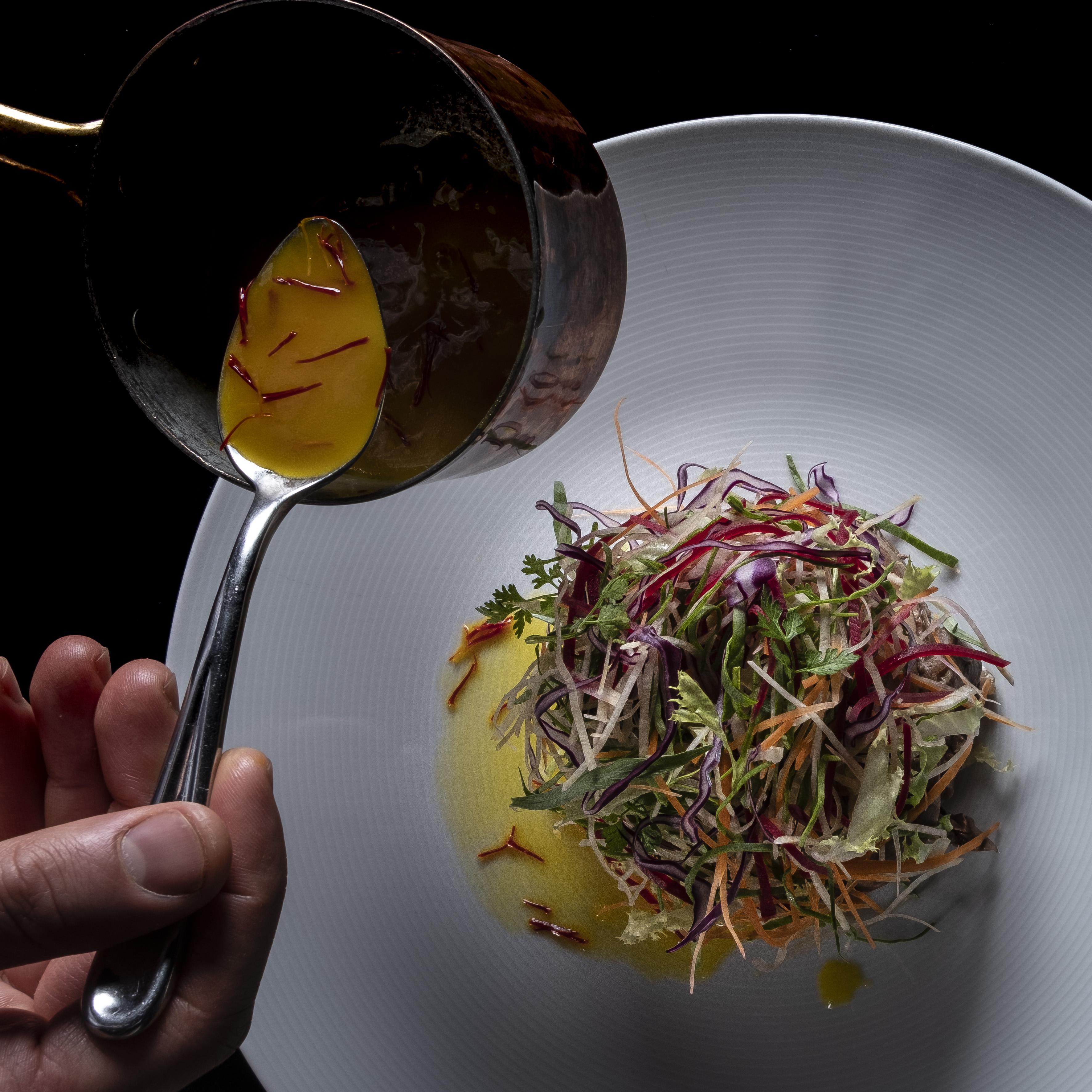 Grand Hotel Campione Campione dʼItalia Exterior foto Saffron being drizzled over a salad