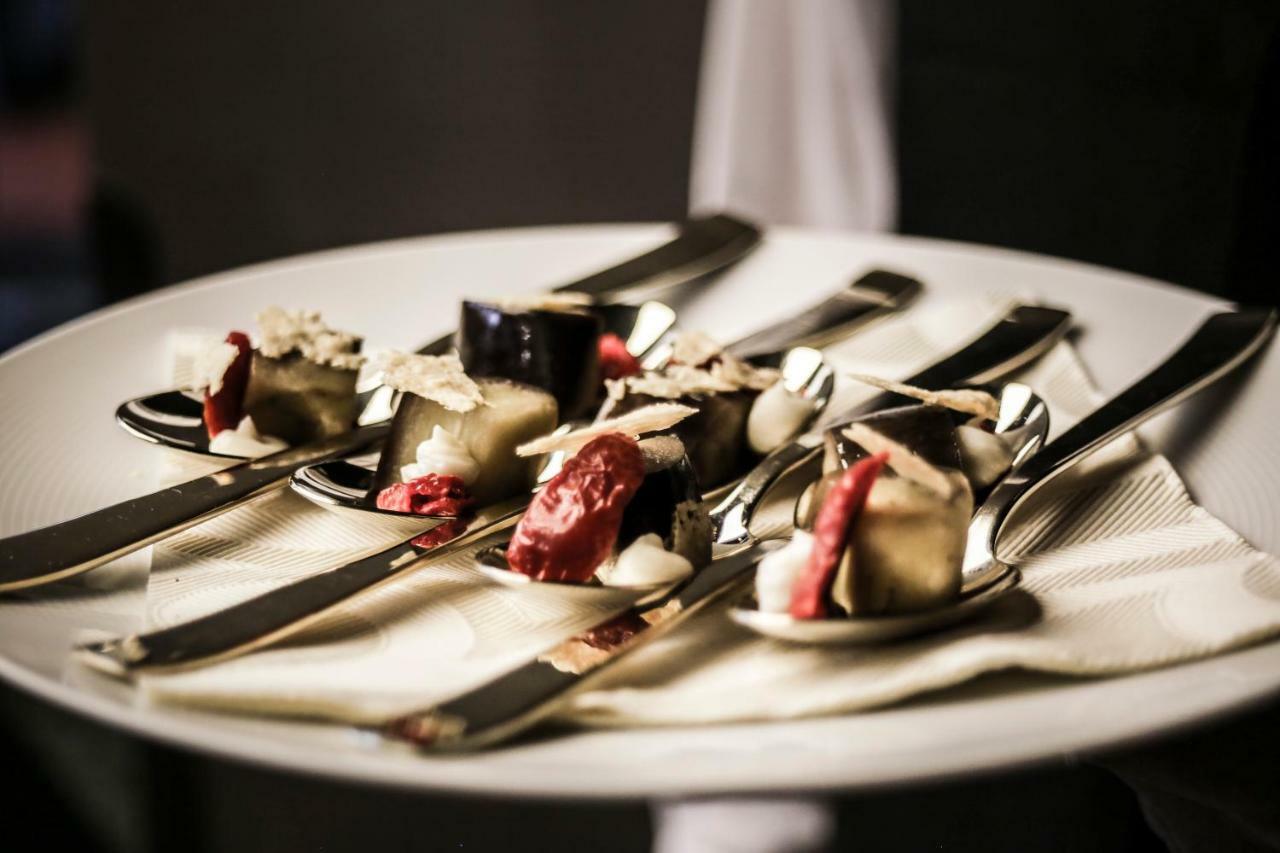 Grand Hotel Campione Campione dʼItalia Exterior foto A plate of canapés